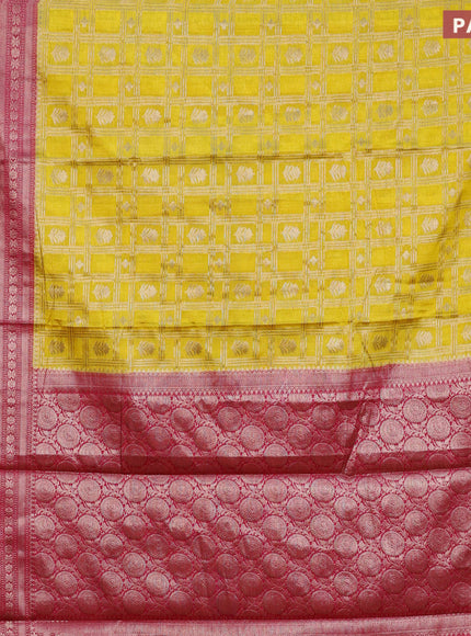 Banarasi semi silk saree yellow and pink with allover zari checks & buttas and long zari woven border