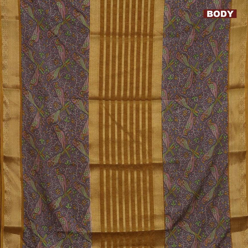 Semi crepe saree dark mustard and grey with zari weaves and long kalamkari printed zari border