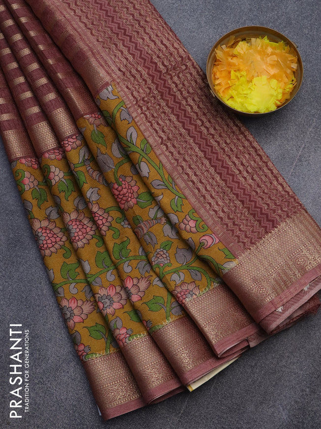 Semi crepe saree brown shade and dark mustard with zari weaves and long kalamkari printed zari border