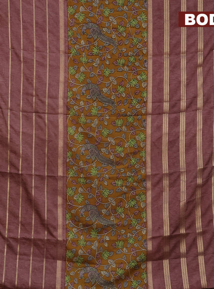 Semi crepe saree mustard shade and rosy brown with kalamkari prints and long zari woven simple border