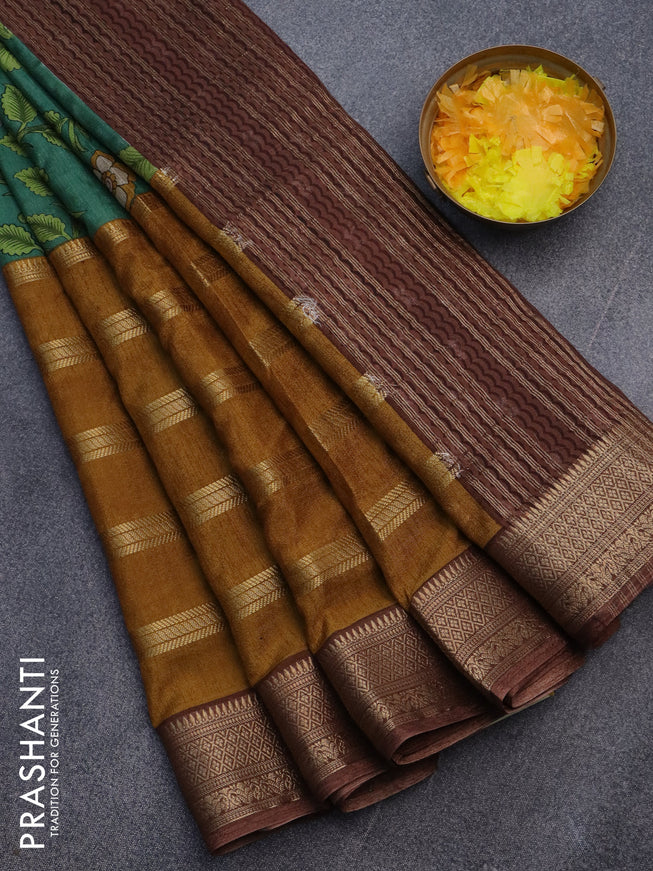 Semi crepe saree green and mustard shade brown with kalamkari prints and long zari woven simple border