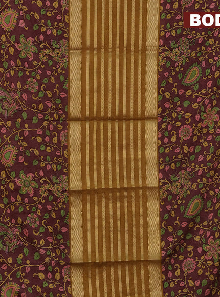 Semi crepe saree dark mustard and brown with zari weaves and long kalamkari printed zari border