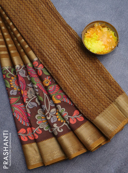 Semi crepe saree dark mustard and brown with zari weaves and long kalamkari printed zari border