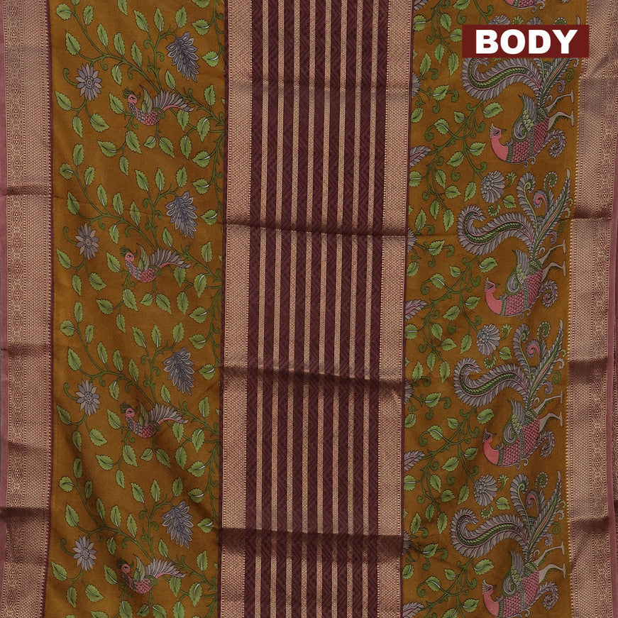 Semi crepe saree pastel maroon and mustard yellow with zari weaves and long kalamkari printed zari border