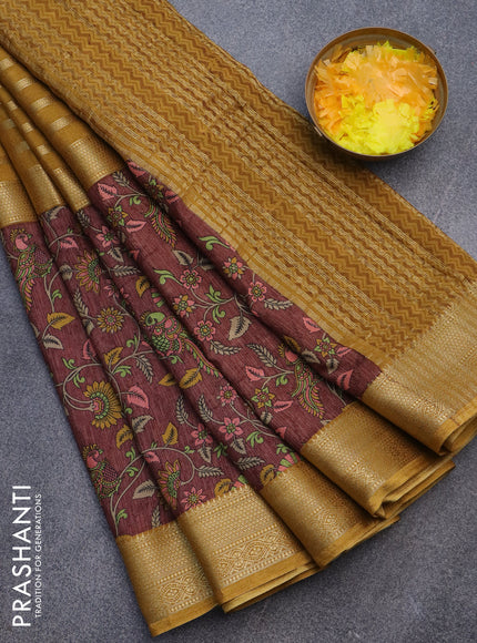 Semi crepe saree dark mustard and brown with zari weaves and long kalamkari printed zari border