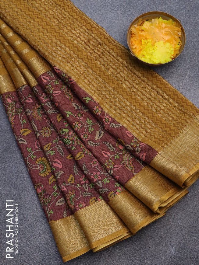 Semi crepe saree dark mustard and brown with zari weaves and long kalamkari printed zari border