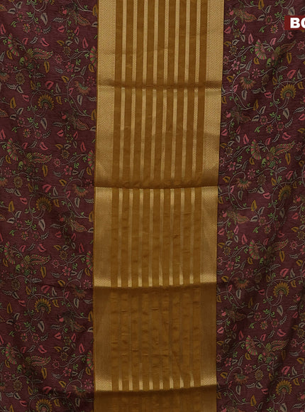 Semi crepe saree dark mustard and brown with zari weaves and long kalamkari printed zari border