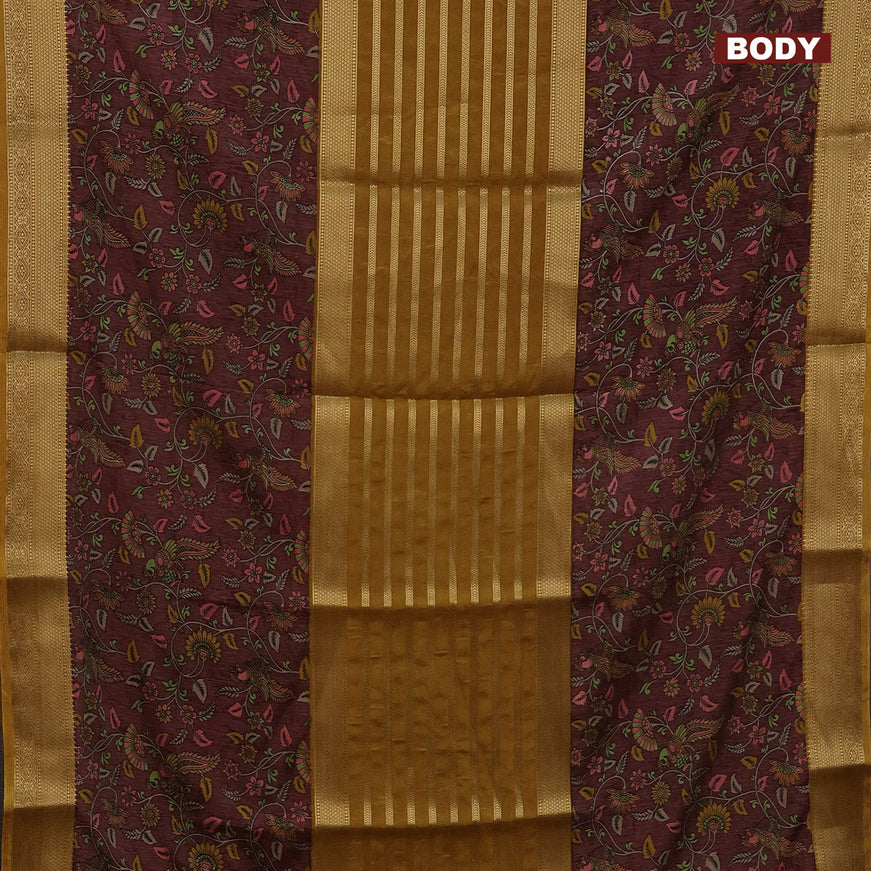 Semi crepe saree dark mustard and brown with zari weaves and long kalamkari printed zari border