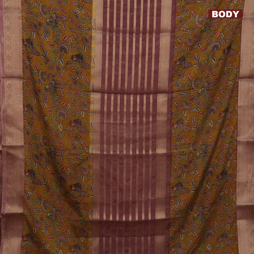 Semi crepe saree pastel brown and dark mustard with zari weaves and long kalamkari printed zari border