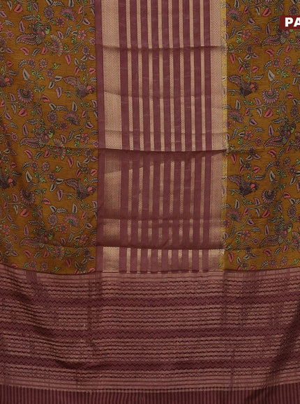 Semi crepe saree pastel brown and dark mustard with zari weaves and long kalamkari printed zari border