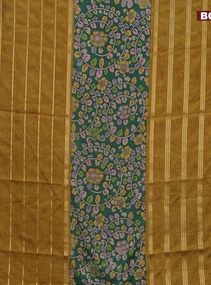 Semi crepe saree green and dark mustard with kalamkari prints and long zari woven simple border