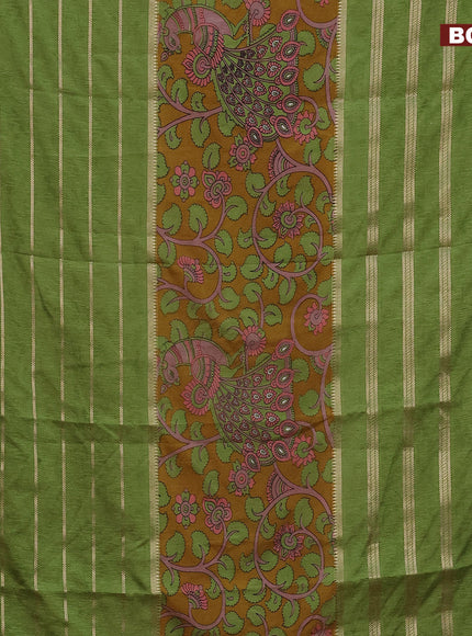 Semi crepe saree mustard yellow and green with kalamkari prints and long zari woven simple border