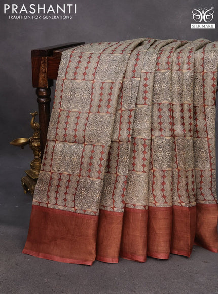 Pure tussar silk saree beige and rust shade with allover prints and zari woven border