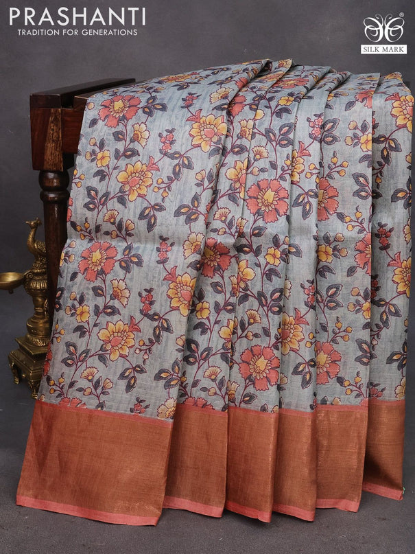 Pure tussar silk saree grey and rust shade with allover floral prints and zari woven border