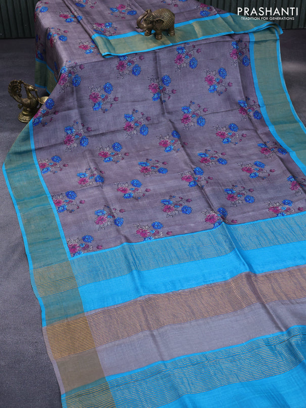 Pure tussar silk saree grey and teal blue with allover floral prints and zari woven border