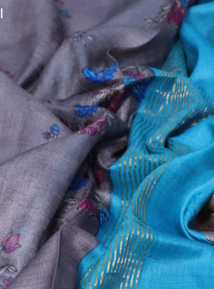 Pure tussar silk saree grey and teal blue with allover floral prints and zari woven border