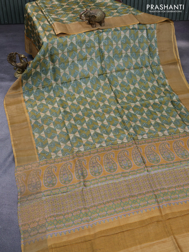 Pure tussar silk saree sap green shade and mustard yellow with allover geometric prints and zari woven border