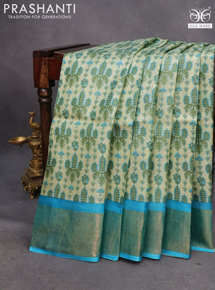 Pure tussar silk saree elaichi green and teal blue with allover prints and zari woven border