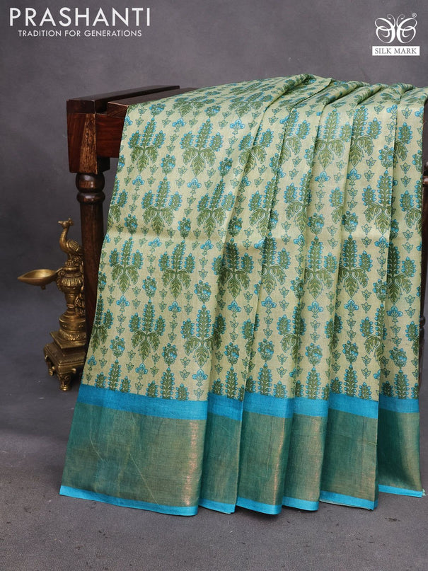 Pure tussar silk saree elaichi green and teal blue with allover prints and zari woven border