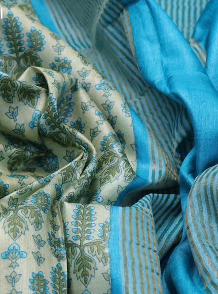 Pure tussar silk saree elaichi green and teal blue with allover prints and zari woven border