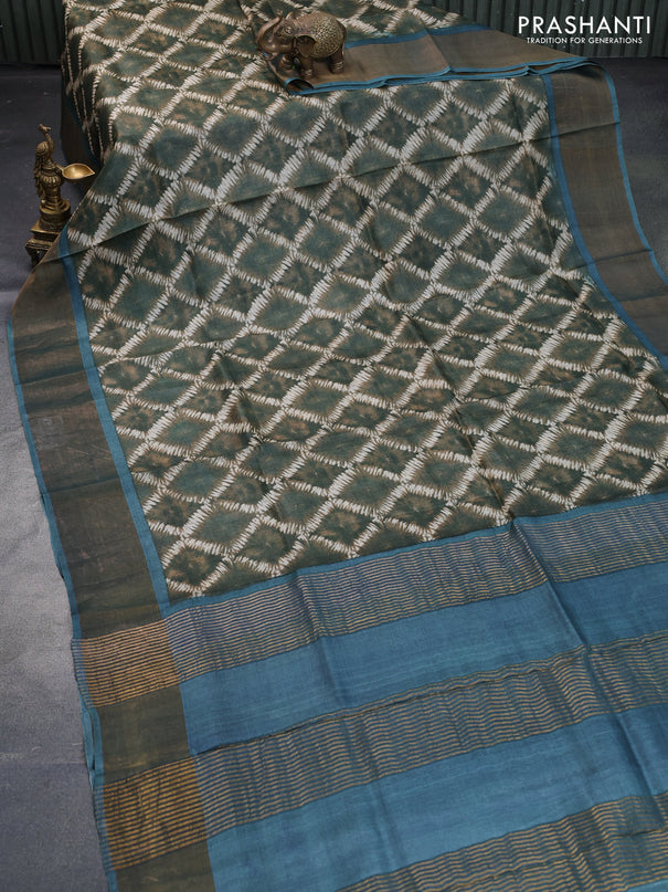 Pure tussar silk saree sap green and blue shade with allover prints and zari woven border