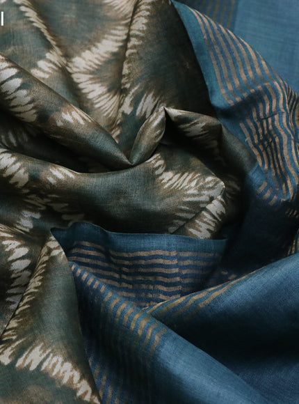 Pure tussar silk saree sap green and blue shade with allover prints and zari woven border