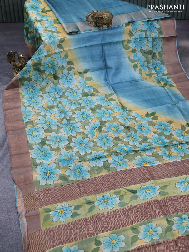 Pure tussar silk saree light blue shade and brown shade with floral hand painted prints and zari woven border