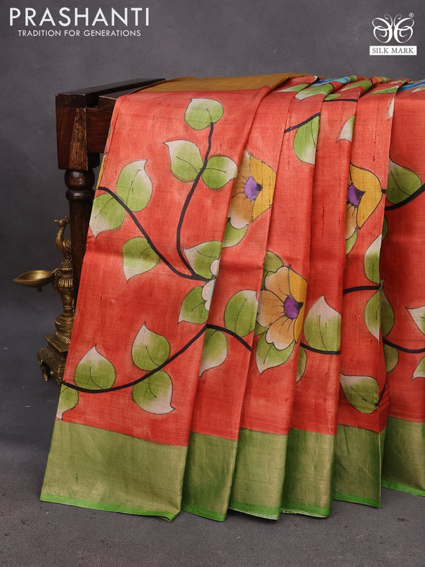 Pure tussar silk saree orange and green with allover kalamkari hand painted prints and zari woven border