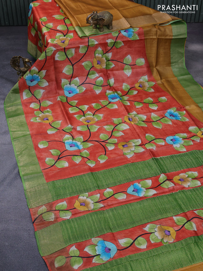 Pure tussar silk saree orange and green with allover kalamkari hand painted prints and zari woven border