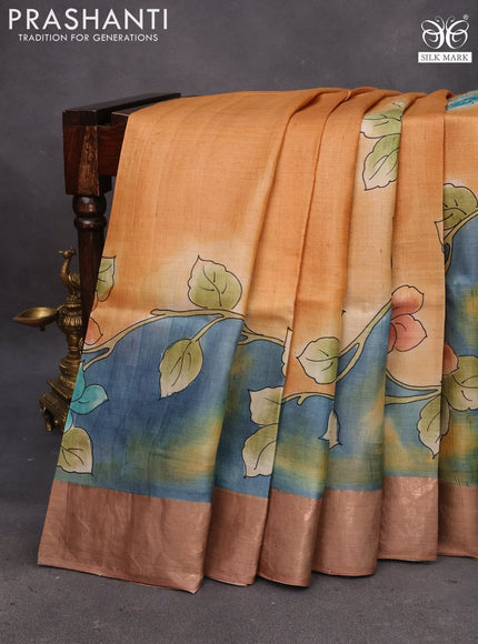 Pure tussar silk saree pale orange and blue brown with floral hand painted prints and zari woven border