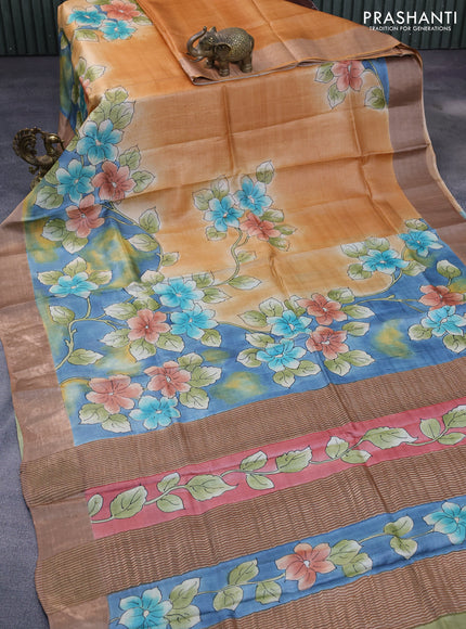 Pure tussar silk saree pale orange and blue brown with floral hand painted prints and zari woven border