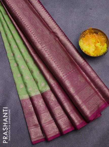 Banarasi semi silk saree pista green and purple with allover thread & zari woven buttas and zari woven border