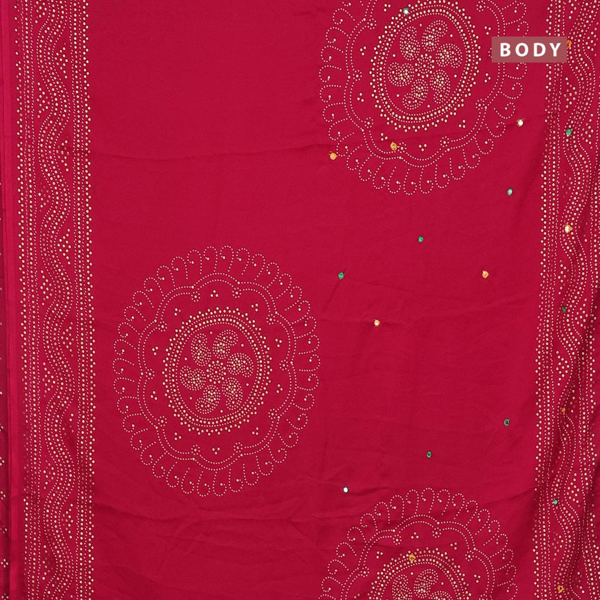 Semi georgette saree reddish pink with allover bandhani prints and mirror work printed border