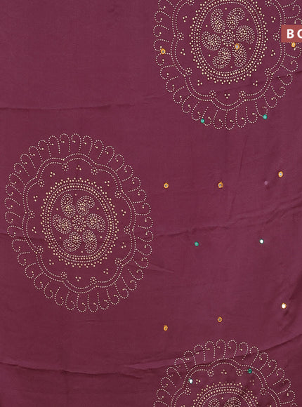 Semi georgette saree pastel pink with allover bandhani prints and mirror work printed border