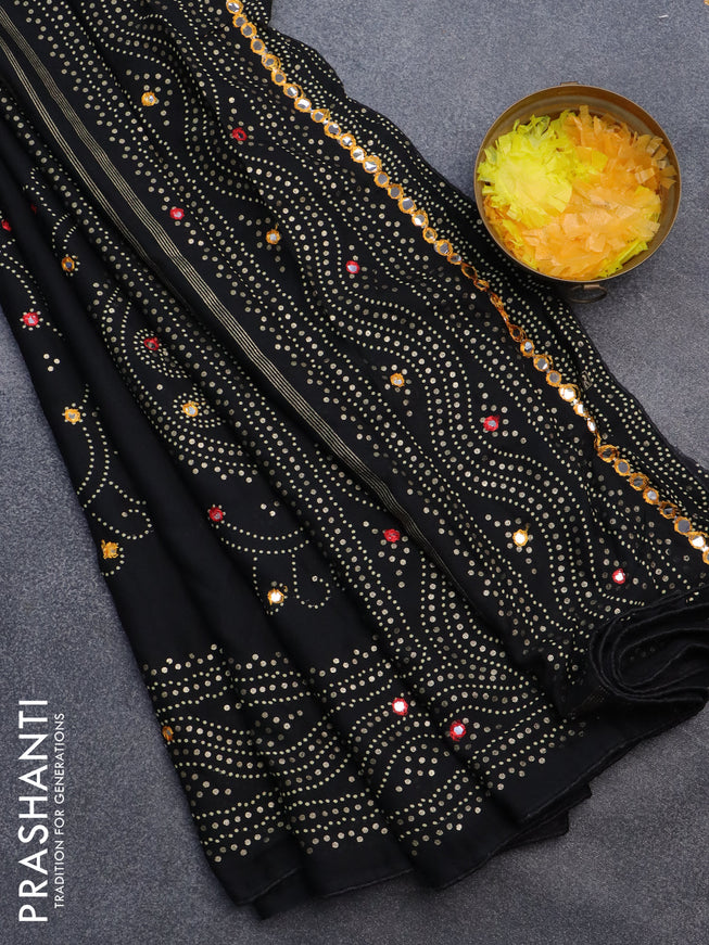 Semi georgette saree black with allover bandhani prints and mirror work printed border