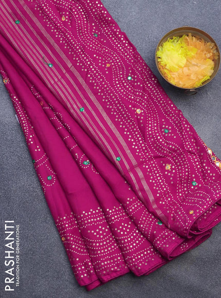 Semi georgette saree pink with allover bandhani prints and mirror work printed border