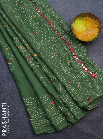 Semi georgette saree pastel green with allover bandhani prints and mirror work printed border