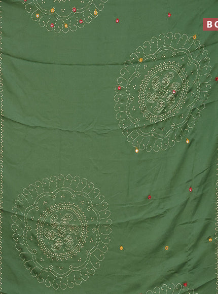 Semi georgette saree pastel green with allover bandhani prints and mirror work printed border