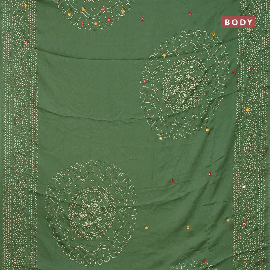 Semi georgette saree pastel green with allover bandhani prints and mirror work printed border