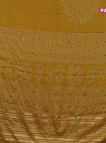 Semi georgette saree mustard yellow with allover bandhani prints and mirror work printed border