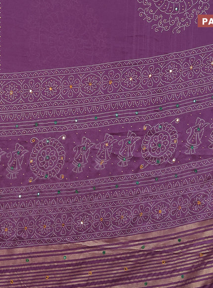 Semi georgette saree pastel violet with allover bandhani prints and mirror work printed border