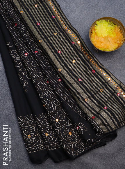 Semi georgette saree black with allover bandhani prints and mirror work printed border