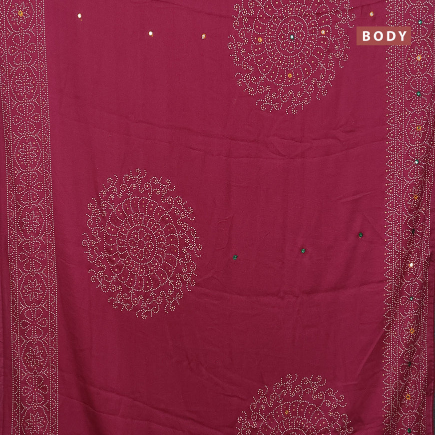 Semi georgette saree onion pink with allover bandhani prints and mirror work printed border