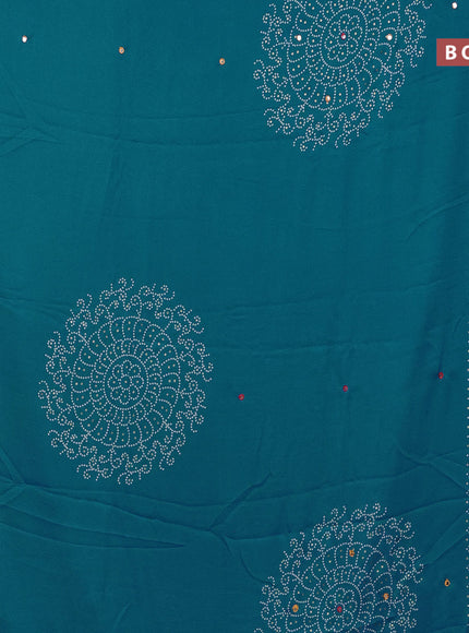 Semi georgette saree cs blue with allover bandhani prints and mirror work printed border