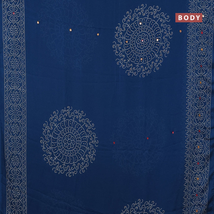 Semi georgette saree peacock blue with allover bandhani prints and mirror work printed border