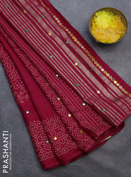 Semi georgette saree dark pink with allover bandhani prints and mirror work printed border