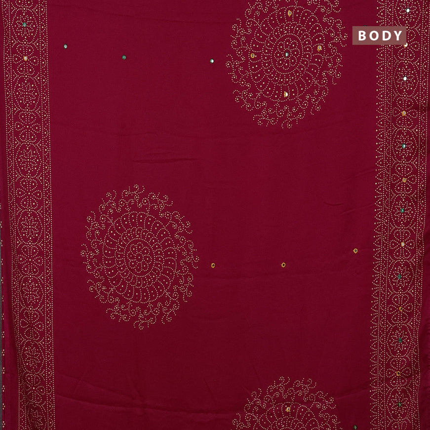 Semi georgette saree dark pink with allover bandhani prints and mirror work printed border