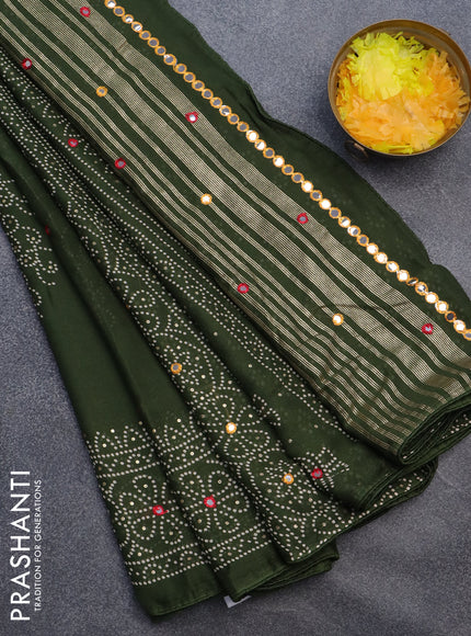 Semi georgette saree sap green with allover bandhani prints and mirror work printed border