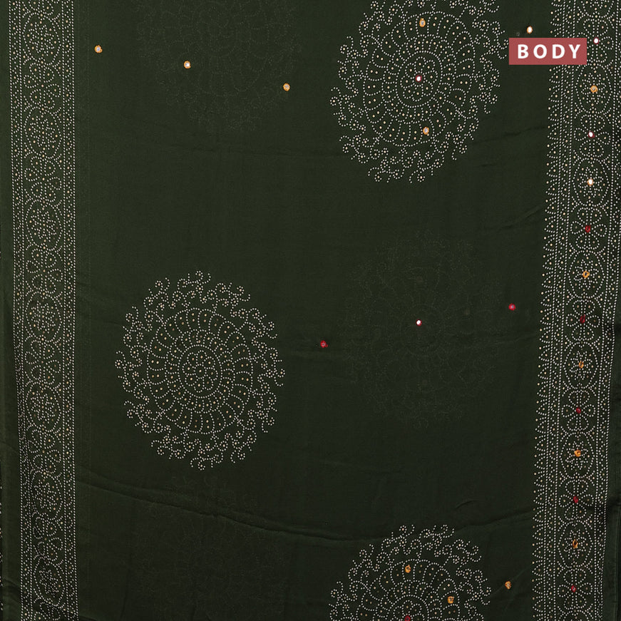 Semi georgette saree sap green with allover bandhani prints and mirror work printed border