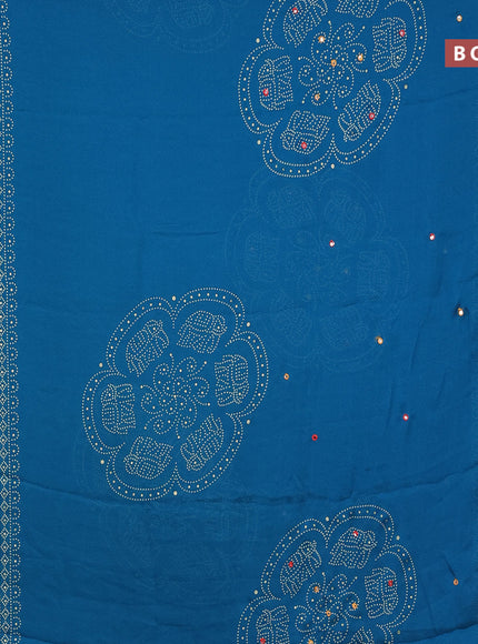 Semi georgette saree cs blue with allover bandhani prints and mirror work printed border